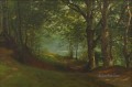 CAMINO JUNTO A UN LAGO EN UN BOSQUE El americano Albert Bierstadt